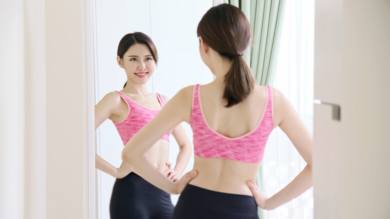 Woman wearing pink bra