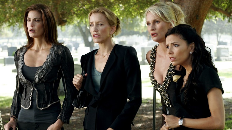 A still from "Desperate Housewives" showing four leading ladies looking concerned