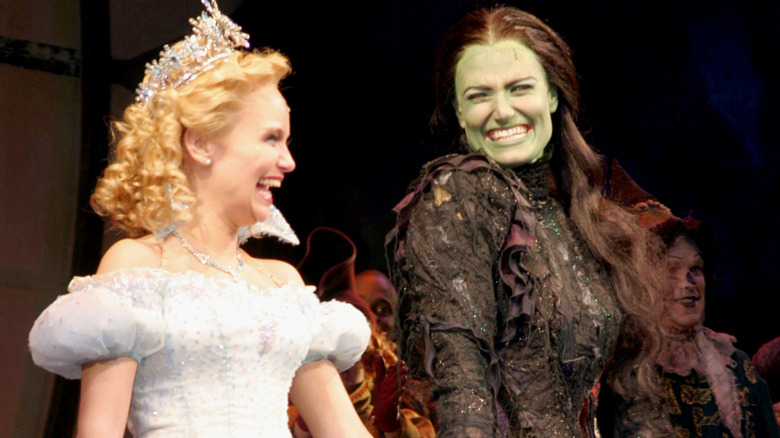 Kristin Chenoweth and Idina Menzel on the Wicked Broadway stage