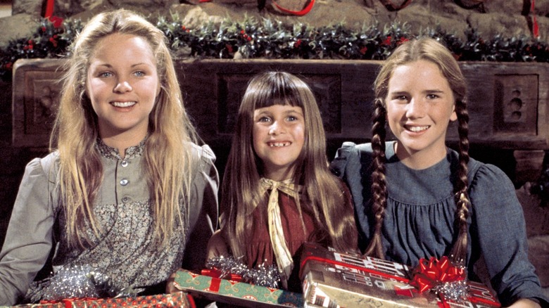 Mary, Carrie, and Laura Ingalls in a scene from Little House on the Prairie