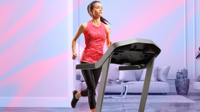 woman running on treadmill at home