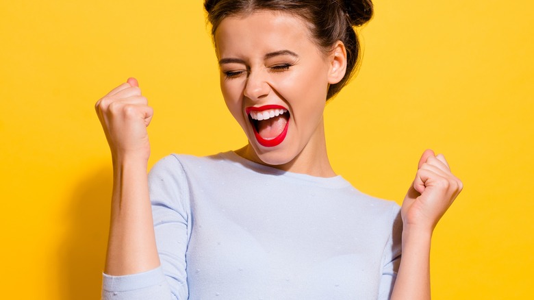 Happy woman cheering