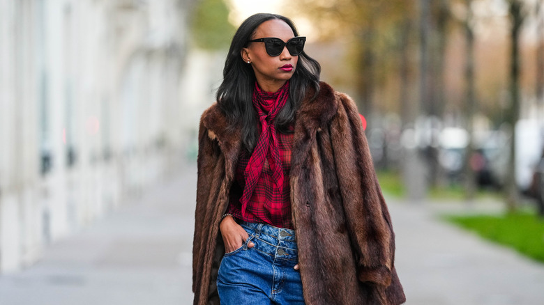 Woman in blouse and jeans