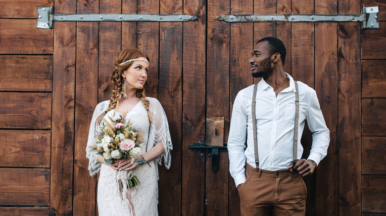 bride and groom barn photo