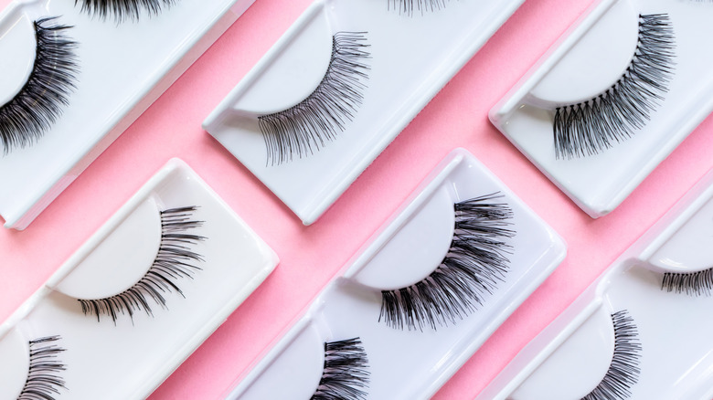 false eyelashes on pink background