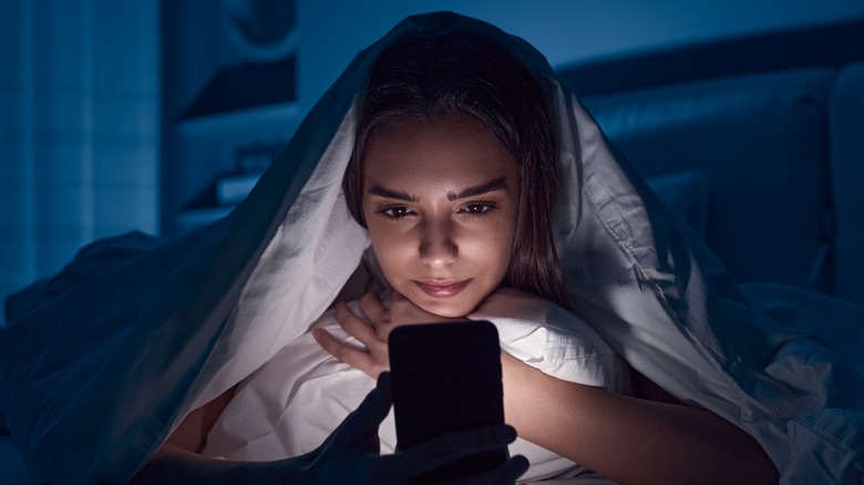 woman in bed alone