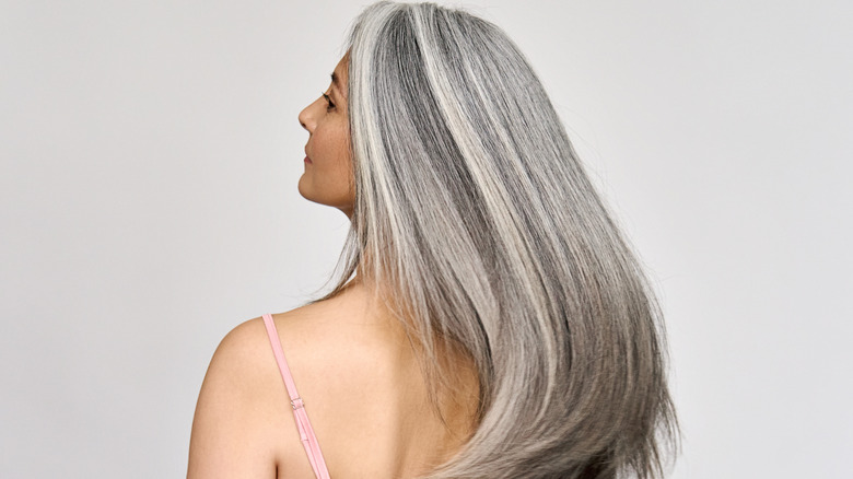 Woman with long gray hair