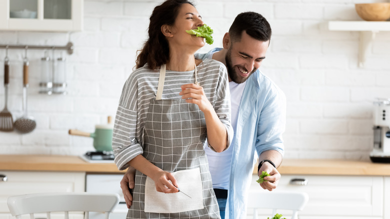 couple having fun in kitchen