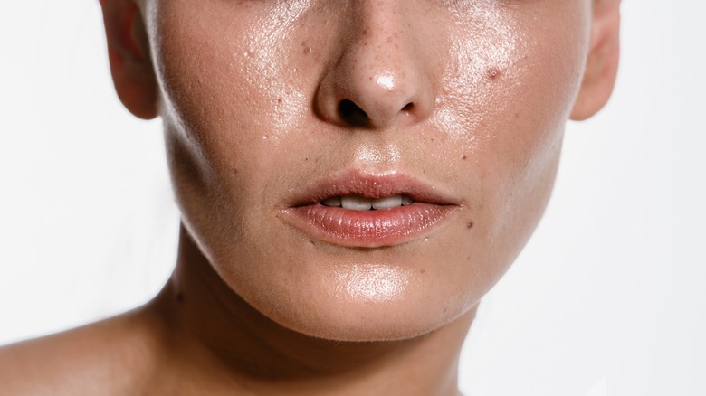 closeup of woman sweating