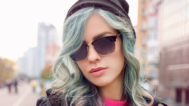 Model with mint green hair