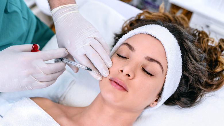 woman getting lip injection