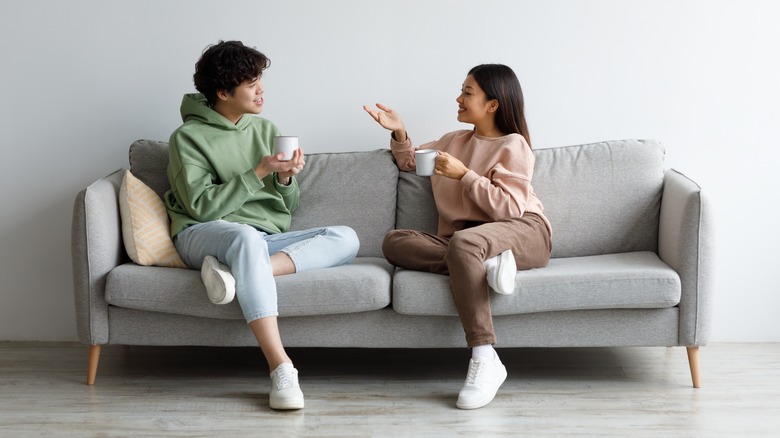 couple talking on the couch 