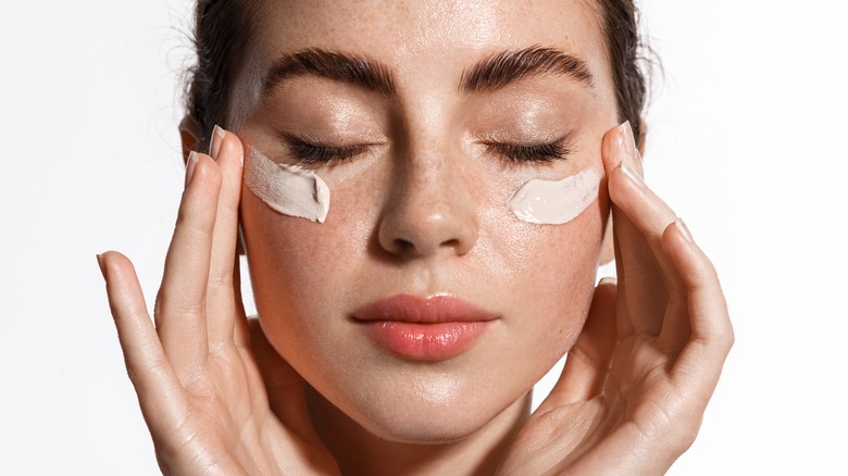 closeup of woman with cream on face