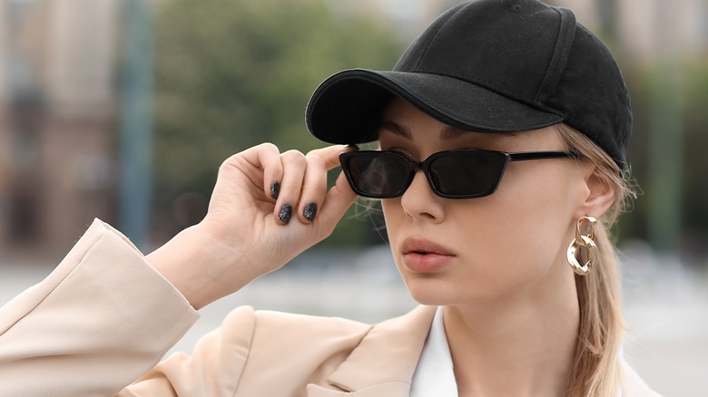 woman wearing baseball cap