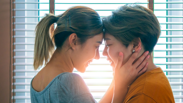 lesbian couple embracing