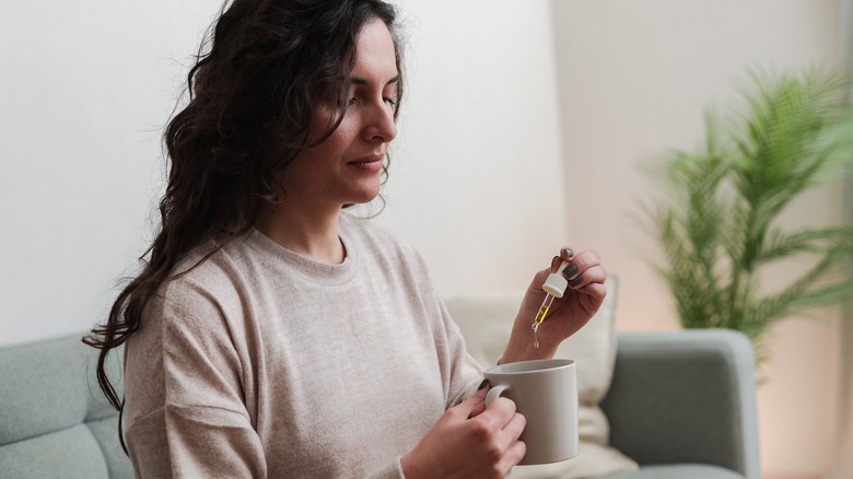 woman taking supplements