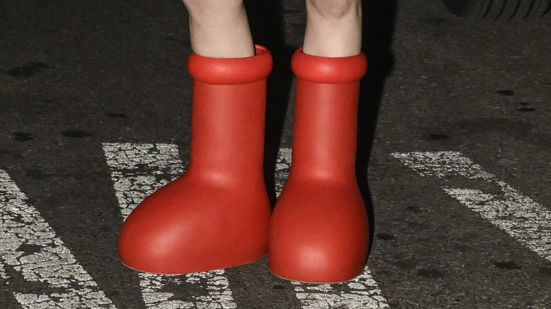 Woman wearing the big red boots
