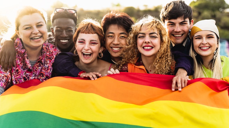 Young people with pride flag