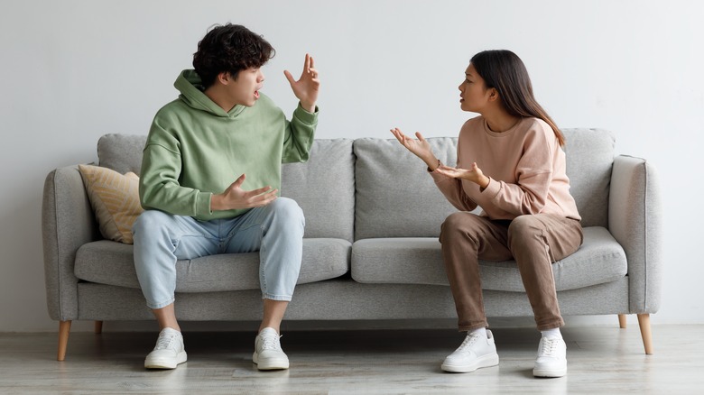 Man and woman on sofa