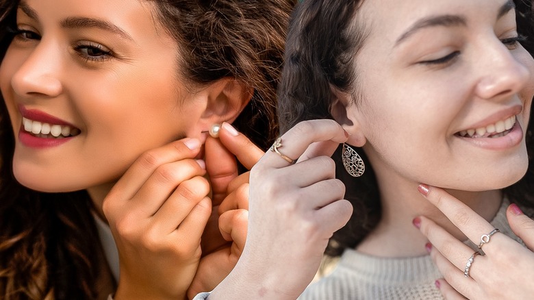 girls touching earrings