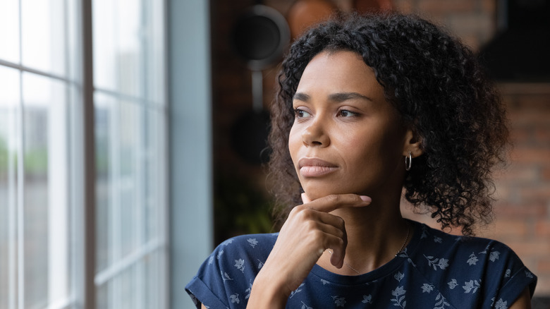 Woman contemplating a decision