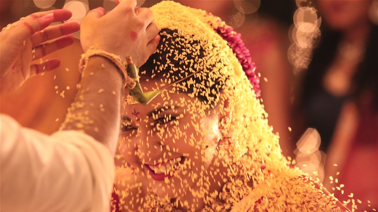 Bride showered in rice
