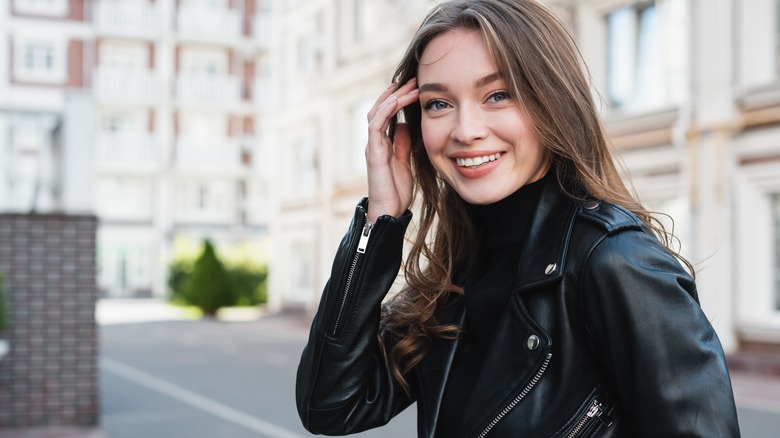 Woman wearing black turtleneck 