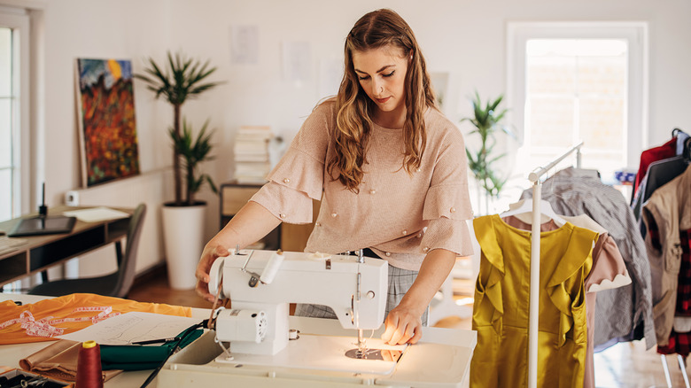 Woman sewing her own clothes