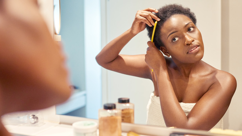 woman parting hair