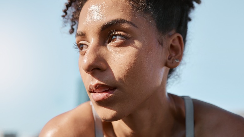 Woman looking sweaty