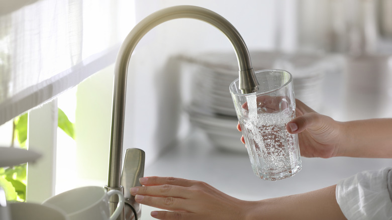 water being poured into glass