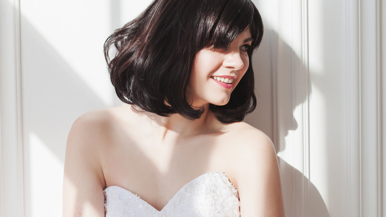 Smiling bride with short hair