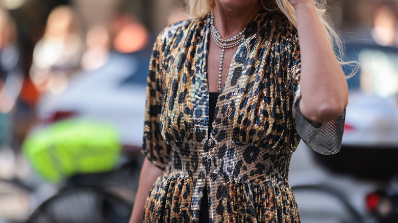 woman in leopard print sequin dress