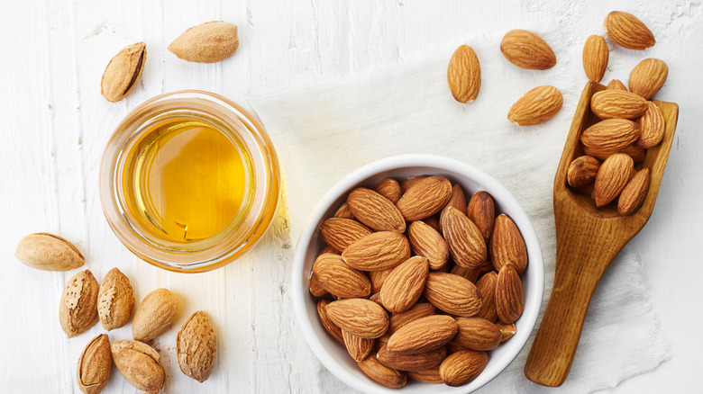 almonds sitting next to oil