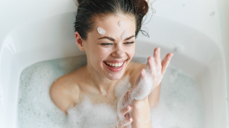 Woman in a soapy bath
