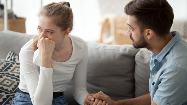 crying woman with man