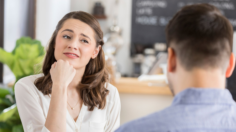 woman uncomfortable on date