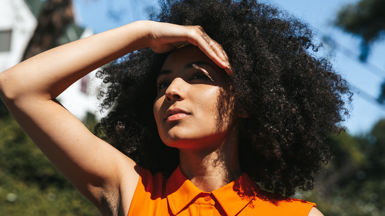 Woman blocking the sun