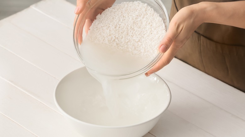 woman preparing rice water