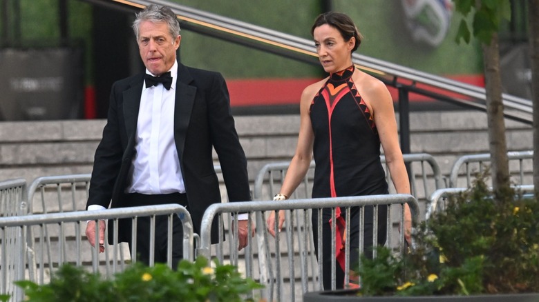 Anna Elisabet Eberstein with Hugh Grant arriving at the Taylor Swift Travis Kelce wedding.