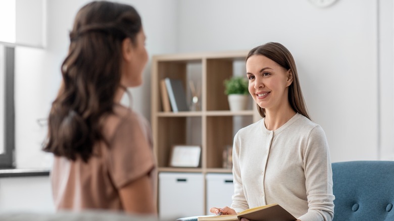 Woman speaks to therapist 
