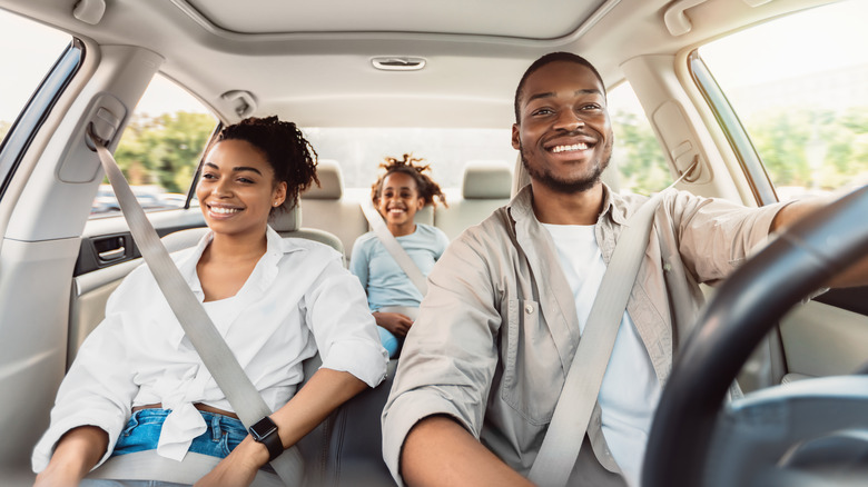 Family navigating in car
