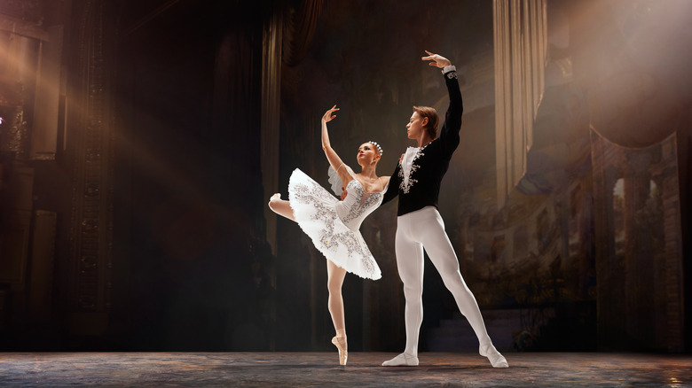 two ballet dancers on stage