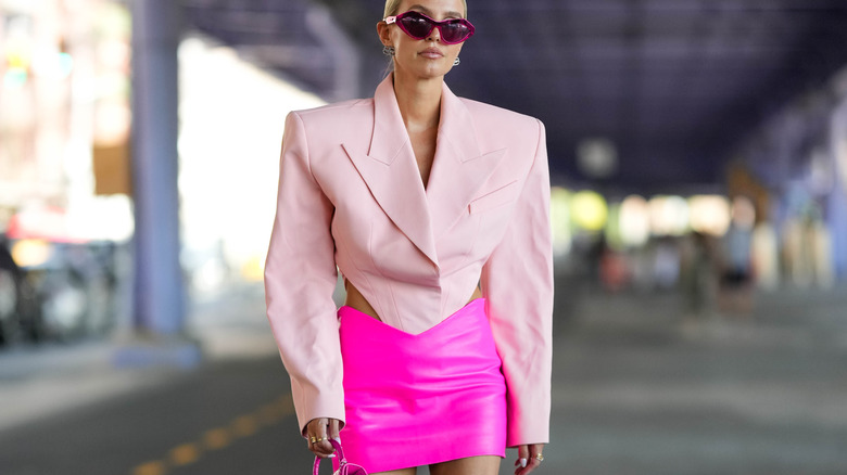 woman in pink suit