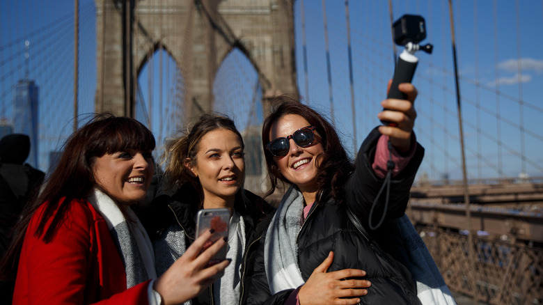 Three friends take a selfie