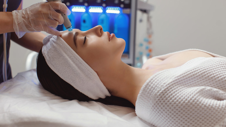 woman receiving microdermabrasion