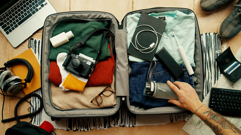 Packing suitcase
