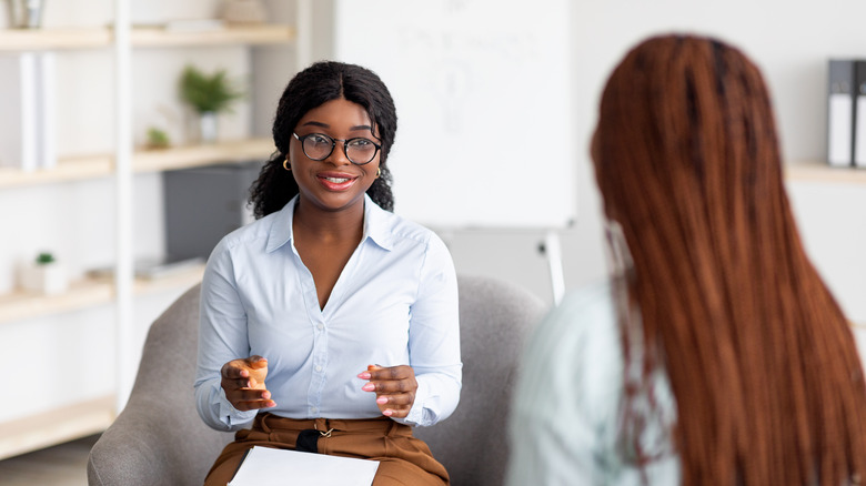Woman talking to a therapist