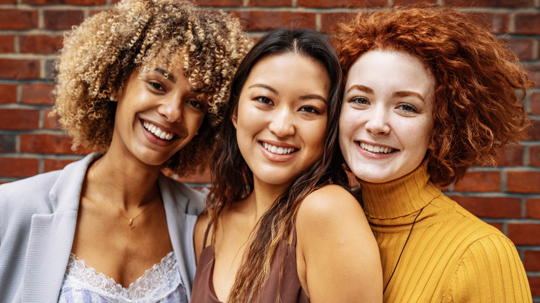 three women with different hair types