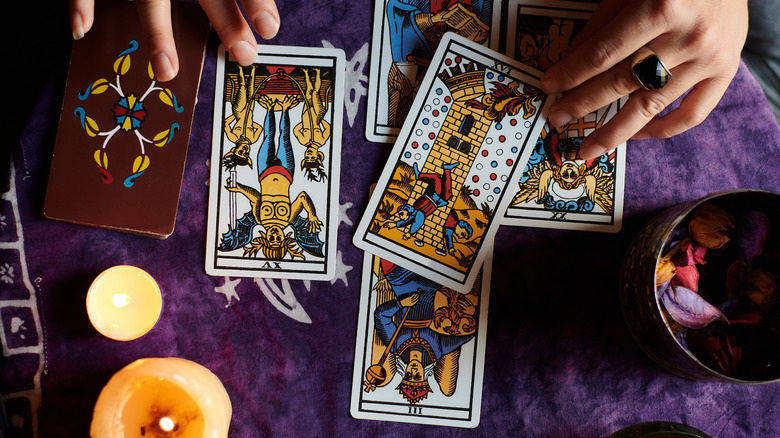 Tarot card spread on tablecloth